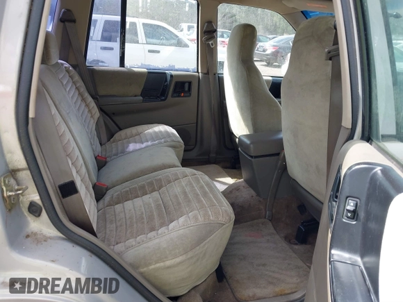 1994 Jeep Grand Cherokee Laredo with VIN 1J4GZ58Y0RC200247, listed as a IAAI auction lot 41781078 with 217,698 mi miles. Bid and sale history available at carsss.com. Image 8.