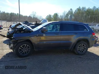 2019 Jeep Grand Cherokee Altitude with VIN 1C4RJEAG3KC534057, listed as a IAAI auction lot 41330391 with 125,175 mi miles and . Bid and sale history available at DreamBid. Image 14.