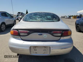 1997 Ford Taurus GL with VIN 1FALP5228VG222228, listed as a Copart auction lot 64806845 with 160,397 mi miles and Salvage title. Bid and sale history available at DreamBid. Image 6.