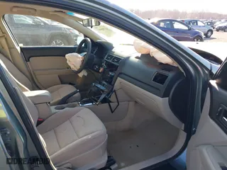 2006 Ford Fusion SE with VIN 3FAHP07116R103391, listed as a IAAI auction lot 41700991 with 115,025 mi miles. Bid and sale history available at carsss.com. Image 5.