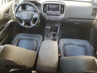 2021 GMC Canyon 4WD AT4 w/Cloth with VIN 1GTG6FEN1M1295551, listed as a Copart auction lot 74900294 with 39,853 mi miles and Salvage Title. Bid and sale history available at carsss.com. Image 8.