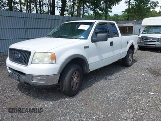 2005 Ford F-150 XLT with VIN 1FTPX14595FB22334, listed as a IAAI auction lot 42806277 with 297,481 mi miles and . Bid and sale history available at DreamBid. Image 2.