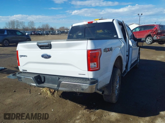 2015 Ford F-150 XLT with VIN 1FTEW1EF8FKE35305, listed as a IAAI auction lot 41679383 with 153,901 mi miles. Bid and sale history available at carsss.com. Image 4.