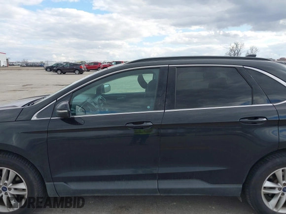 2015 Ford Edge SEL with VIN 2FMTK3J94FBB47320, listed as a IAAI auction lot 41982477 with 136,005 mi miles. Bid and sale history available at carsss.com. Image 14.
