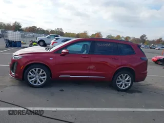 2020 Cadillac XT6 AWD Sport z VIN 1GYKPHRS1LZ201472, wystawiony jako IAAI lot #40610438 z przebiegiem 71 540 mil mil oraz . Historia ofert i sprzedaży dostępna na DreamBid. Obrazek 14.