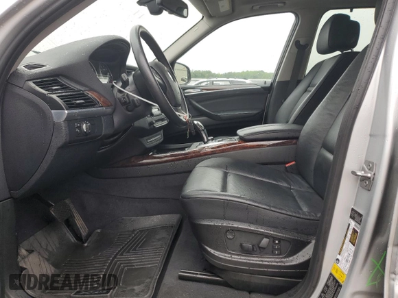 2012 BMW X5 35i with VIN 5UXZV4C57CL747717, listed as a Copart auction lot 63003135 with 135,999 mi miles and Clean title. Bid and sale history available at DreamBid. Image 7.