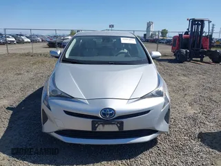2017 Toyota Prius Two with VIN JTDKBRFU7H3032469, listed as a IAAI auction lot 42097816 with 65,853 mi miles and . Bid and sale history available at DreamBid. Image 12.