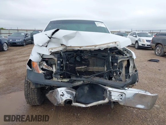 2014 Ford F-150 XL with VIN 1FTFX1CFXEKF94927, listed as a IAAI auction lot 42441473 with 127,857 mi miles and . Bid and sale history available at DreamBid. Image 12.
