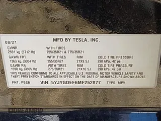 2021 Tesla Model Y Performance with VIN 5YJYGDEF6MF252877, listed as a IAAI auction lot 41770770 with 58,550 mi miles and . Bid and sale history available at DreamBid. Image 9.
