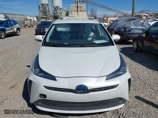 2021 Toyota Prius L Eco with VIN JTDKAMFUXM3142402, listed as a IAAI auction lot 41665484 with 67,416 mi miles. Bid and sale history available at carsss.com. Image 12.