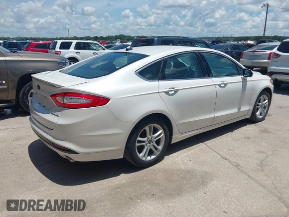 2016 Ford Fusion Titanium with VIN 3FA6P0SU5GR120687, listed as a IAAI auction lot 42571006 with 143,210 mi miles and . Bid and sale history available at DreamBid. Image 4.