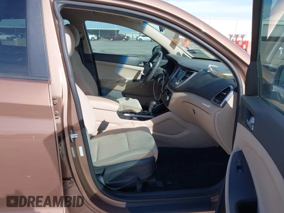 2016 Hyundai Tucson Limited with VIN KM8J33A20GU137662, listed as a IAAI auction lot 41818149 with 120,010 mi miles. Bid and sale history available at carsss.com. Image 5.