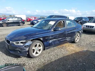2014 BMW 3 Series 328d xDrive with VIN WBA3D5C53EKX95091, listed as a IAAI auction lot 41696613 with 117,982 mi miles. Bid and sale history available at carsss.com. Image 2.
