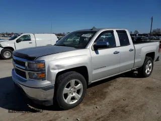 2015 Chevrolet Silverado 1500 LS with VIN 1GCRCPEH1FZ335827, listed as a Copart auction lot 50414585 with 214,079 mi miles and Salvage Title. Bid and sale history available at DreamBid. Image 1.