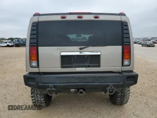 2003 Hummer H2 with VIN 5GRGN23U73H102412, listed as a Copart auction lot 87419024 with 176,456 mi miles and Salvage Title. Bid and sale history available at carsss.com. Image 6.
