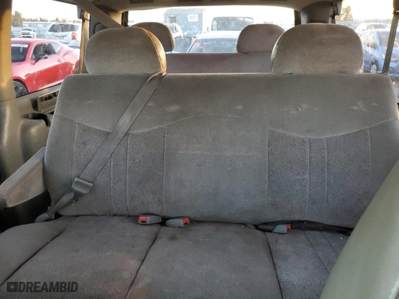 2002 GMC Safari Passenger with VIN 1GKDM19XX2B510542, listed as a Copart auction lot 87019404 with 232,100 mi miles and Salvage Title. Bid and sale history available at carsss.com. Image 10.
