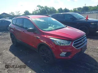2017 Ford Escape SE z VIN 1FMCU9GD4HUA10240, wystawiony jako IAAI lot #42392522 z przebiegiem 82 325 mil mil oraz . Historia ofert i sprzedaży dostępna na DreamBid. Obrazek 1.