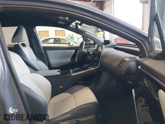 2023 Subaru Solterra Limited with VIN JTMABABA9PA021704, listed as a IAAI auction lot 41707243 with 13,519 mi miles and . Bid and sale history available at DreamBid. Image 5.