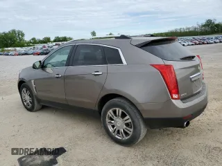 2011 Cadillac SRX Luxury Collection z VIN 3GYFNAEY8BS619208, wystawiony jako Copart lot #58321585 z przebiegiem 176 560 mil mil oraz Nie do naprawy • Non repairable. Historia ofert i sprzedaży dostępna na DreamBid. Obrazek 2.