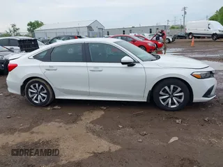 2024 Honda Civic LX z VIN 2HGFE2F20RH523593, wystawiony jako IAAI lot #42213468 z przebiegiem 13 561 mil mil oraz . Historia ofert i sprzedaży dostępna na DreamBid. Obrazek 13.