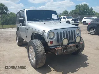2009 Jeep Wrangler X with VIN 1J4FA24189L755392, listed as a IAAI auction lot 42811063 with 97,644 mi miles and . Bid and sale history available at DreamBid. Image 1.