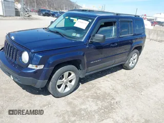 2014 Jeep Patriot Latitude with VIN 1C4NJRFB0ED760607, listed as a IAAI auction lot 41846134 with 136,041 mi miles. Bid and sale history available at carsss.com. Image 2.