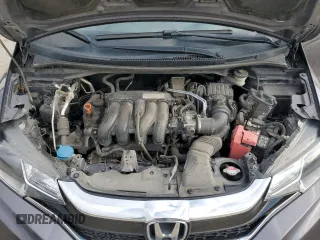 2020 Honda Fit LX z VIN 3HGGK5H43LM726158, wystawiony jako Copart lot #50379965 z przebiegiem 188 969 mil mil oraz Szkoda całkowita • Salvage title. Historia ofert i sprzedaży dostępna na DreamBid. Obrazek 13.