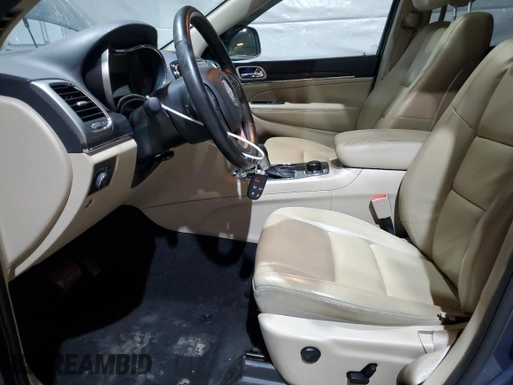 2021 Jeep Grand Cherokee 80th Anniversary z VIN 1C4RJFBG0MC752948, wystawiony jako Copart lot #57801725 z przebiegiem 51 611 mil mil oraz Szkoda całkowita • Salvage title. Historia ofert i sprzedaży dostępna na DreamBid. Obrazek 7.
