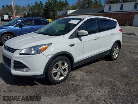 2013 Ford Escape SE with VIN 1FMCU0GXXDUA73875, listed as a IAAI auction lot 42164115 with 195,712 mi miles and . Bid and sale history available at carsss.com. Image 2.