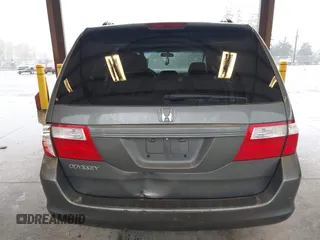 2007 Honda Odyssey EX with VIN 5FNRL38417B054717, listed as a IAAI auction lot 41955733 with 157,076 mi miles. Bid and sale history available at carsss.com. Image 16.