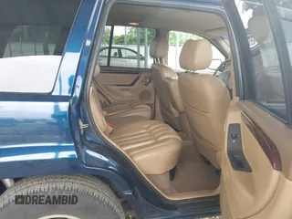 2000 Jeep Grand Cherokee Limited with VIN 1J4GW58S9YC347699, listed as a IAAI auction lot 42545373 with 118,566 mi miles and . Bid and sale history available at DreamBid. Image 8.