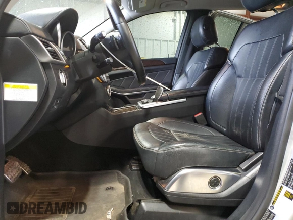 2013 Mercedes-Benz GL 450 z VIN 4JGDF7CE5DA249552, wystawiony jako Copart lot #52590995 z przebiegiem 128 518 mil mil oraz Szkoda całkowita • Salvage title. Historia ofert i sprzedaży dostępna na DreamBid. Obrazek 7.