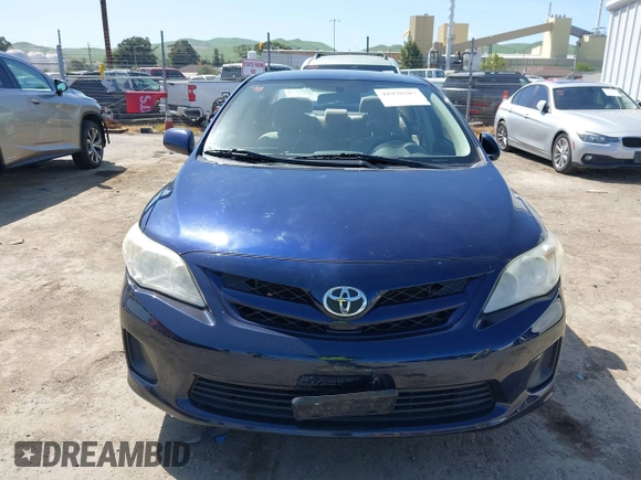 2011 Toyota Corolla L with VIN JTDBU4EE9B9167657, listed as a IAAI auction lot 41970387 with 89,300 mi miles. Bid and sale history available at carsss.com. Image 13.