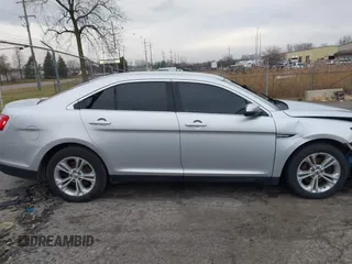 2016 Ford Taurus SEL with VIN 1FAHP2E83GG148711, listed as a IAAI auction lot 41206630 with 115,816 mi miles and . Bid and sale history available at DreamBid. Image 13.