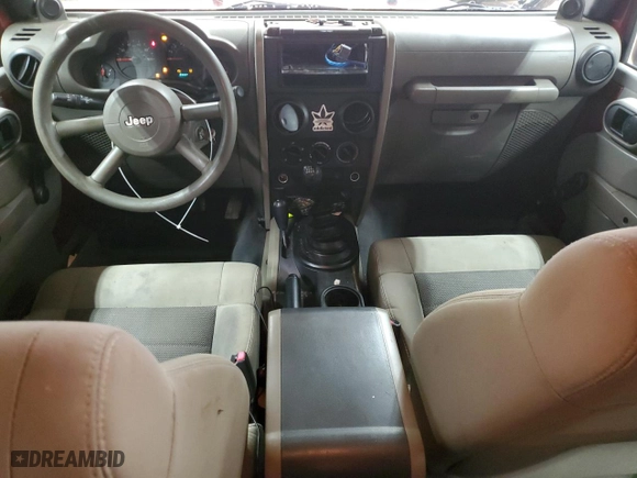 2009 Jeep Wrangler Unlimited X with VIN 1J4GA39149L704314, listed as a Copart auction lot 42699415 with 132,456 mi miles and Salvage Title. Bid and sale history available at carsss.com. Image 8.
