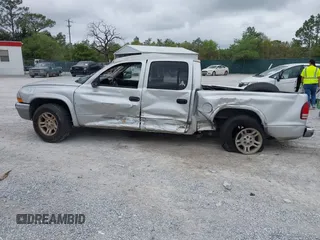2003 Dodge Dakota SLT with VIN 1D7HL48N13S274856, listed as a IAAI auction lot 41954038 with 306,728 mi miles. Bid and sale history available at carsss.com. Image 14.