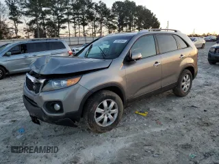 2012 Kia Sorento LX with VIN 5XYKTCA69CG256544, listed as a Copart auction lot 85510044 with 167,395 mi miles and Salvage Title. Bid and sale history available at DreamBid. Image 1.