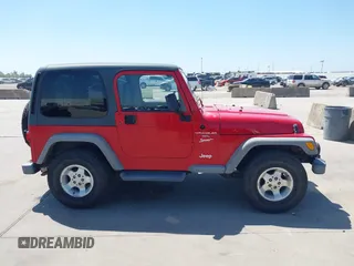 2001 Jeep Wrangler Sport with VIN 1J4FA49S11P375854, listed as a IAAI auction lot 42334037 with 215,027 mi miles and . Bid and sale history available at DreamBid. Image 13.