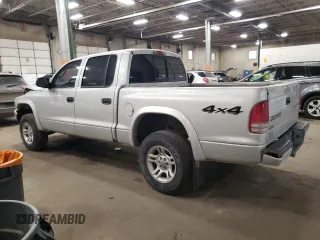 2004 Dodge Dakota Sport z VIN 1D7HG38N34S508009, wystawiony jako Copart lot #42217205 z przebiegiem 168 446 mil mil oraz Szkoda całkowita • Salvage title. Historia ofert i sprzedaży dostępna na DreamBid. Obrazek 2.