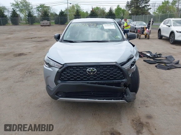2023 Toyota Corolla Cross L with VIN 7MUAAABG4PV063424, listed as a IAAI auction lot 42119578 with 14,743 mi miles and . Bid and sale history available at DreamBid. Image 13.