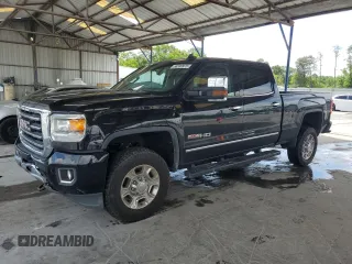 2015 GMC Sierra 2500HD SLT z VIN 1GT12ZE88FF513794, wystawiony jako Copart lot #56530975 z przebiegiem 197 393 mil mil oraz Czysty tytuł • Clean title. Historia ofert i sprzedaży dostępna na DreamBid. Obrazek 1.