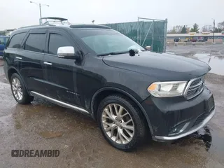 2014 Dodge Durango Citadel with VIN 1C4RDJEG5EC466164, listed as a IAAI auction lot 40936279 with 259,102 mi miles and . Bid and sale history available at DreamBid. Image 1.