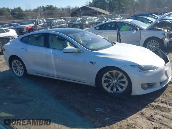 2017 Tesla Model S 100D with VIN 5YJSA1E22HF219352, listed as a IAAI auction lot 41831322 with 97,516 mi miles and . Bid and sale history available at DreamBid. Image 13.