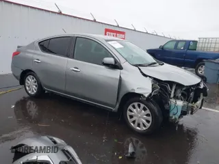 2014 Nissan Versa S with VIN 3N1CN7AP1EK462041, listed as a IAAI auction lot 41640390 with 148,241 mi miles. Bid and sale history available at carsss.com. Image 1.