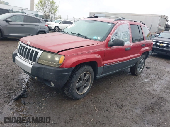 2004 Jeep Grand Cherokee Laredo with VIN 1J4GW48S94C151816, listed as a IAAI auction lot 41983332 with 151,227 mi miles. Bid and sale history available at carsss.com. Image 17.