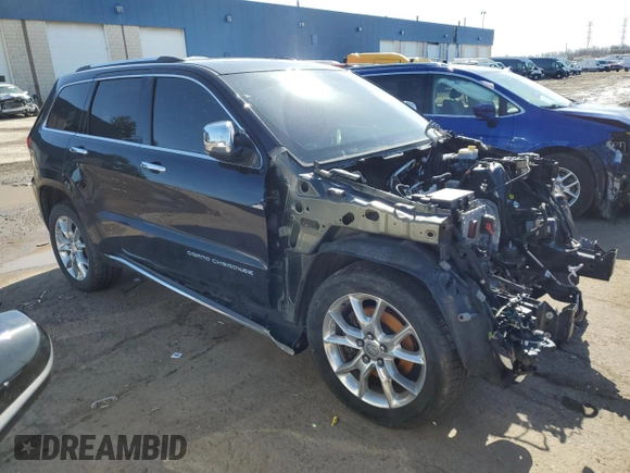 2015 Jeep Grand Cherokee Summit with VIN 1C4RJFJTXFC129919, listed as a Copart auction lot 51232445 with Not Provided miles and Clean Title. Bid and sale history available at DreamBid. Image 4.