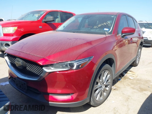 2021 Mazda CX-5 Grand Touring with VIN JM3KFADM4M0476615, listed as a IAAI auction lot 42004814 with 42,483 mi miles. Bid and sale history available at carsss.com. Image 17.