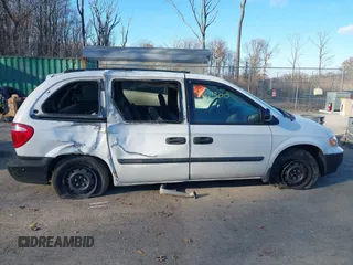 2005 Dodge Caravan SE with VIN 1D4GP25R45B305819, listed as a IAAI auction lot 41011300 with 229,466 mi miles and . Bid and sale history available at carsss.com. Image 13.