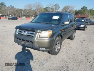 2006 Honda Pilot EX-L with VIN 5FNYF18766B026721, listed as a IAAI auction lot 41690993 with 219,473 mi miles and . Bid and sale history available at DreamBid. Image 2.