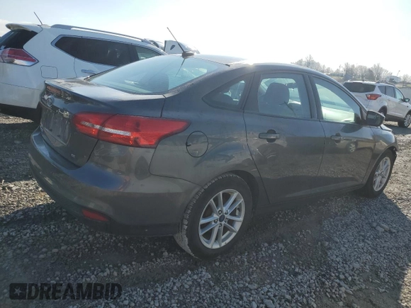 2016 Ford Focus SE with VIN 1FADP3F23GL384944, listed as a Copart auction lot 49876395 with 74,087 mi miles and Salvage title. Bid and sale history available at DreamBid. Image 3.